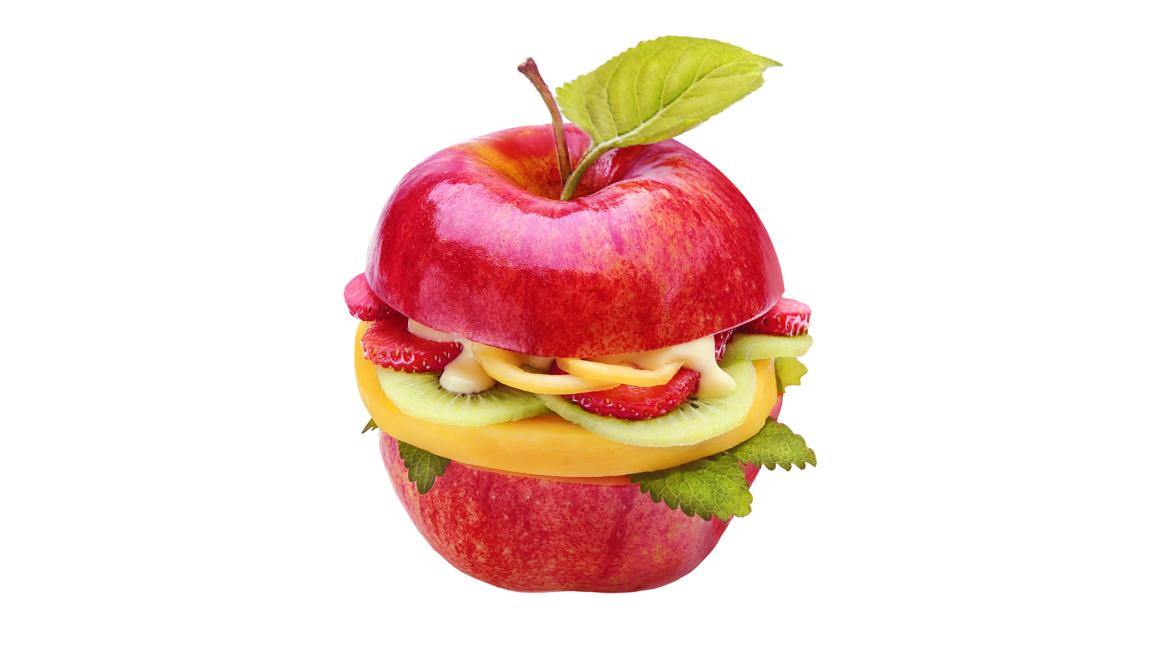 Apfel als Burger, gefüllt mit anderem Obst