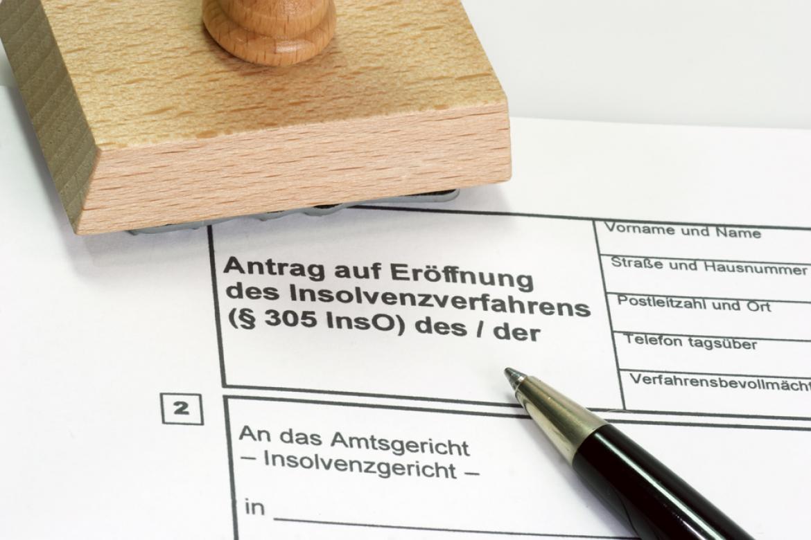 Antrag auf Eröffnung eines Insolvenzverfahrens, Stempel, Kugelschreiber